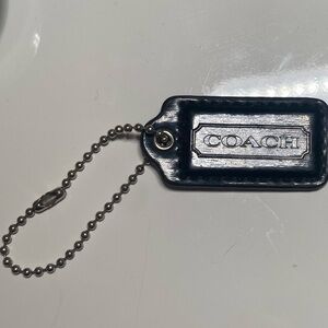 COACH Black Patent Leather Tag